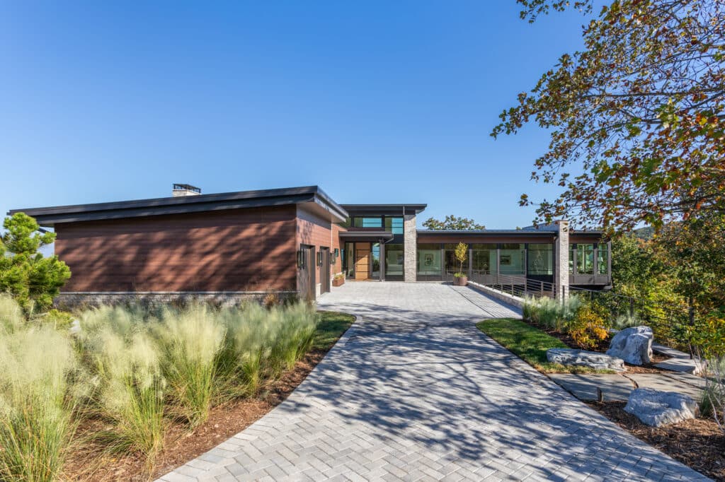 entry approach; modern home; limestone and glass; luxury home builder Greenville SC.